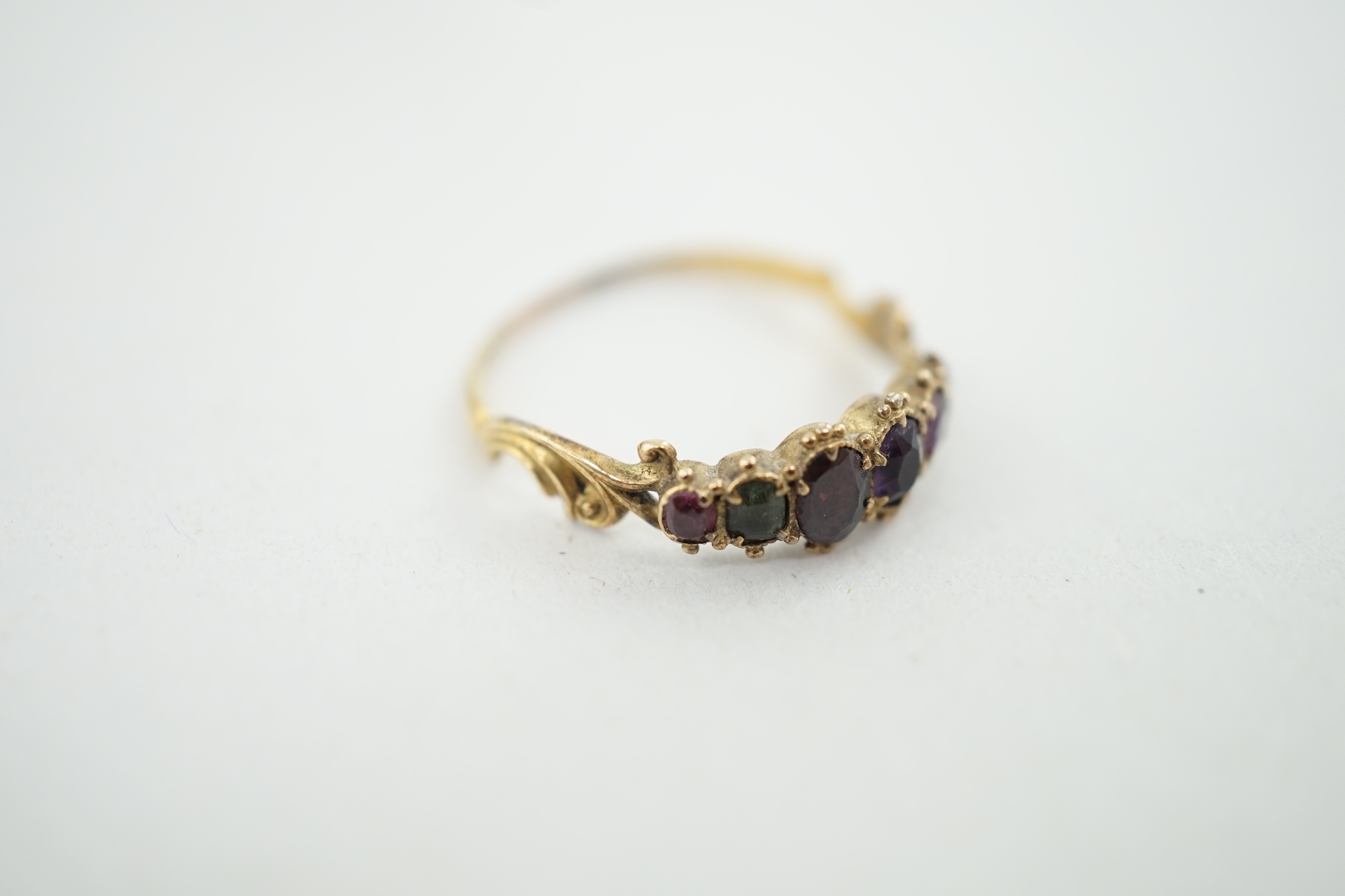 A Victorian gold and gem set 'Regard' half hoop ring